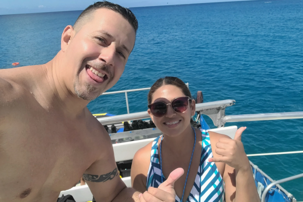 Visitors posing a picture on cruise