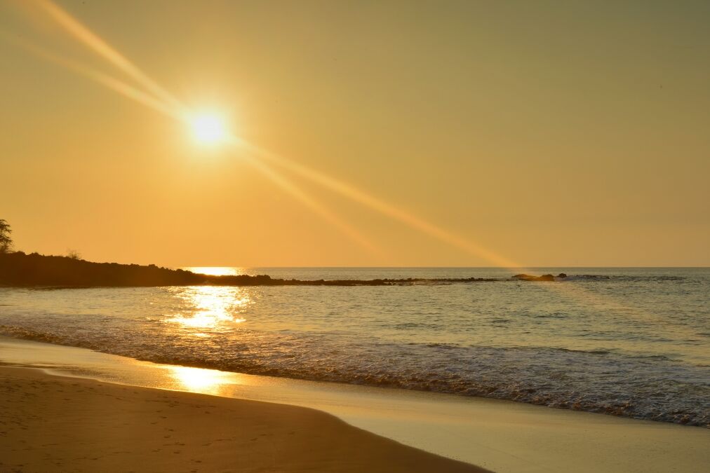 beautiful sunset at Mauna Kea beach Big Island of Hawaii