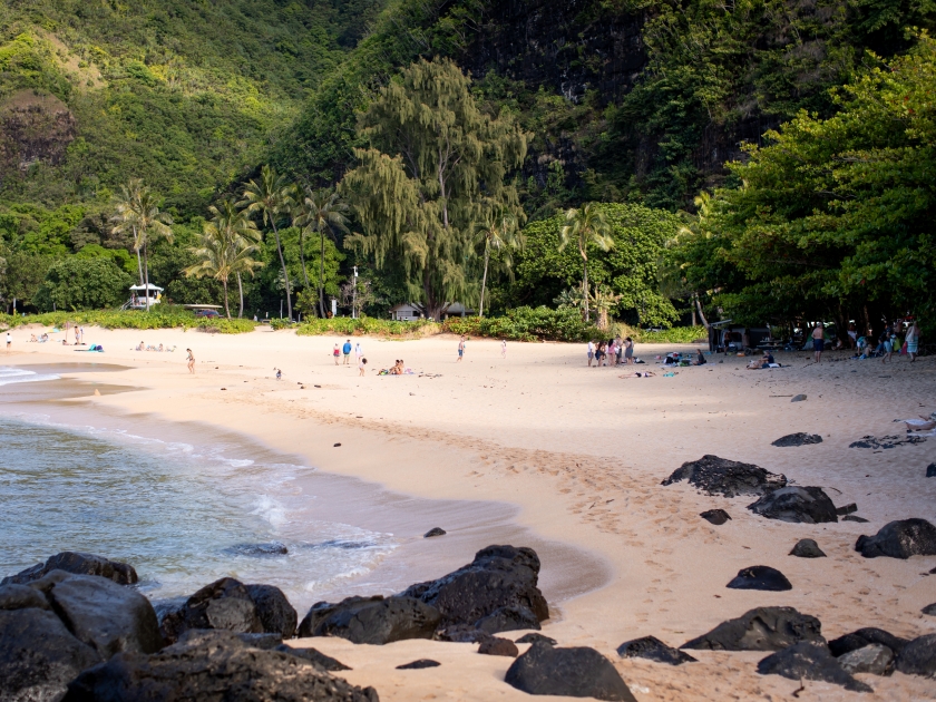 Haena Beach Park, Kauai US - July 20, 2024: a beautiful sandy Haena Beach park full of people on the North Shore of Kauai, Hawaii on a sunny day