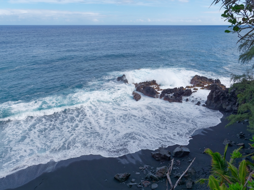 View from the hill at beautiful Kehena black sand beach located in the Big Island's Puna district, Hawaii