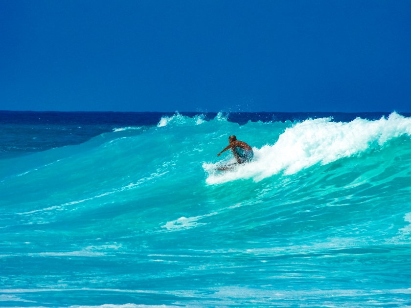 Surfing winter waves at Kua Bay on the Big Island of Hawaii