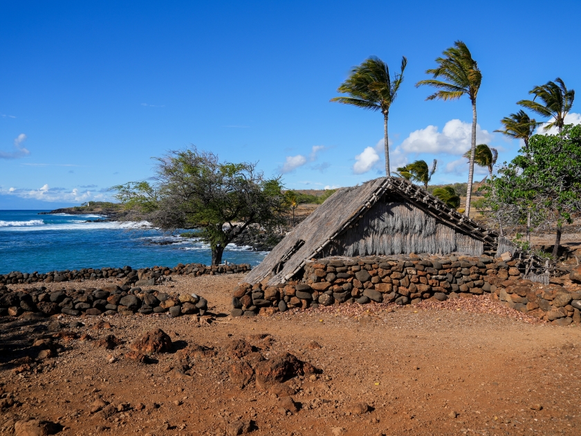 Reconstructed Hawaiian Hale facing the Pacific Ocean in the ancient fishing village in ruins of the Lapakahi State Historical Park on the island of Hawai'i (Big Island) in the United States