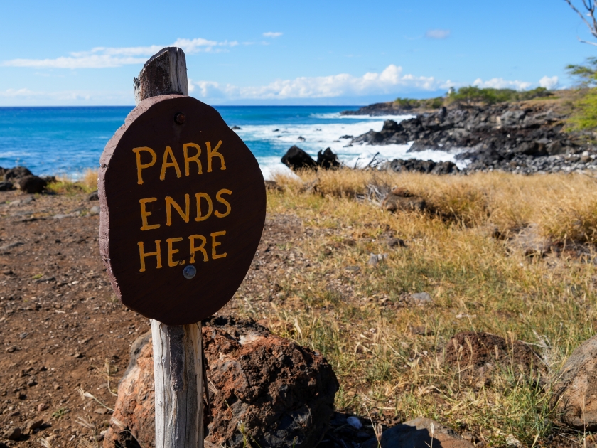 Wooden sign in the Lapakahi State Historical Park on the island of Hawai'i (Big Island) in the Pacific Ocean