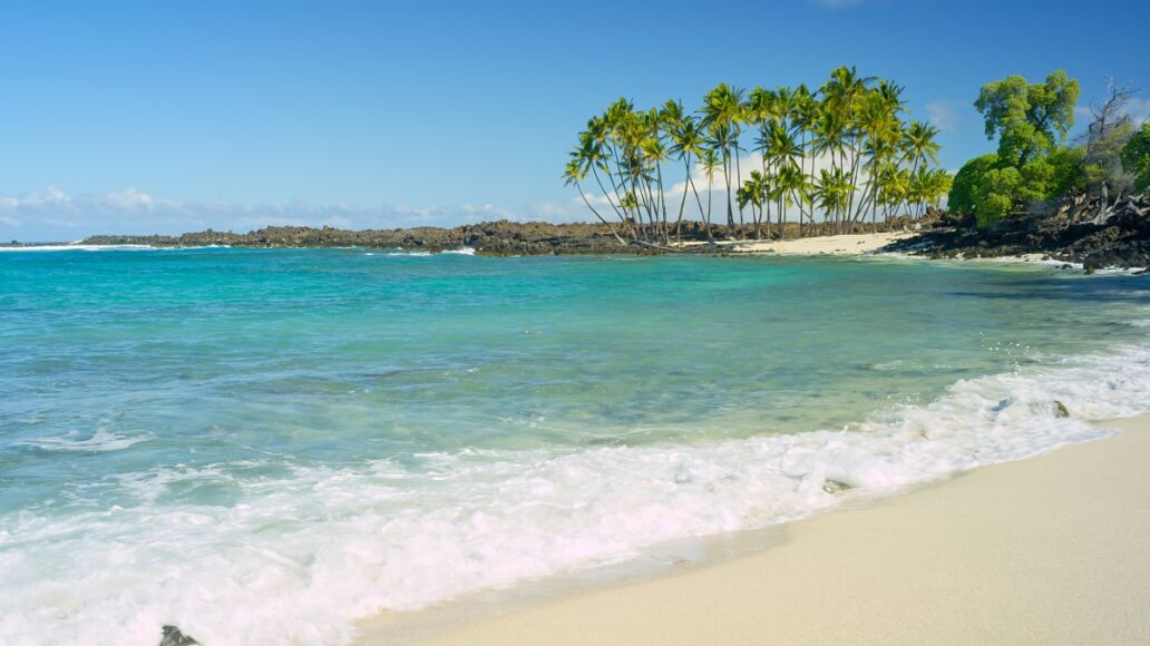 Small Waves On Sandy Island Beach