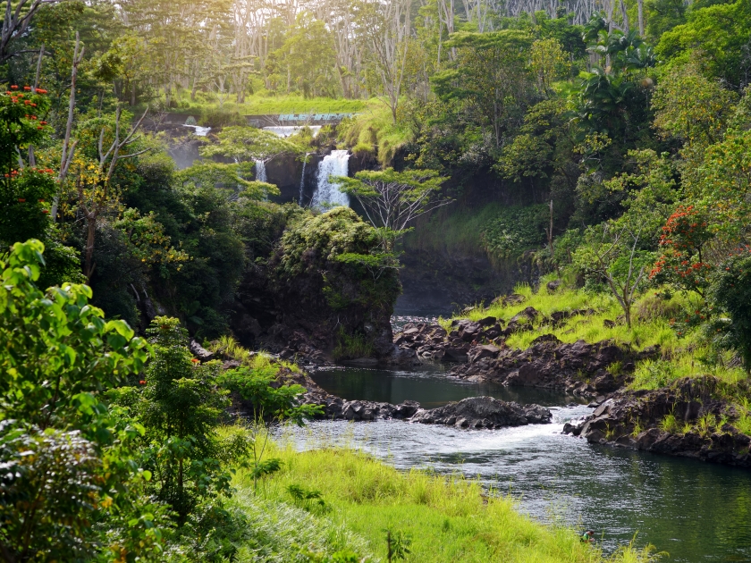 Majesitc Pee Pee Falls waterfall in Hilo, Wailuku River State Park, Hawaii, USA
