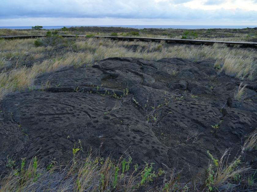 Prehistoric carving on a lava rock part of the 