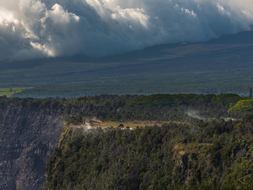 Steam vents and sulphur banks at Hawaii volcanoes national park on the big island of Hawaii - see Maunaloa slopes in the background