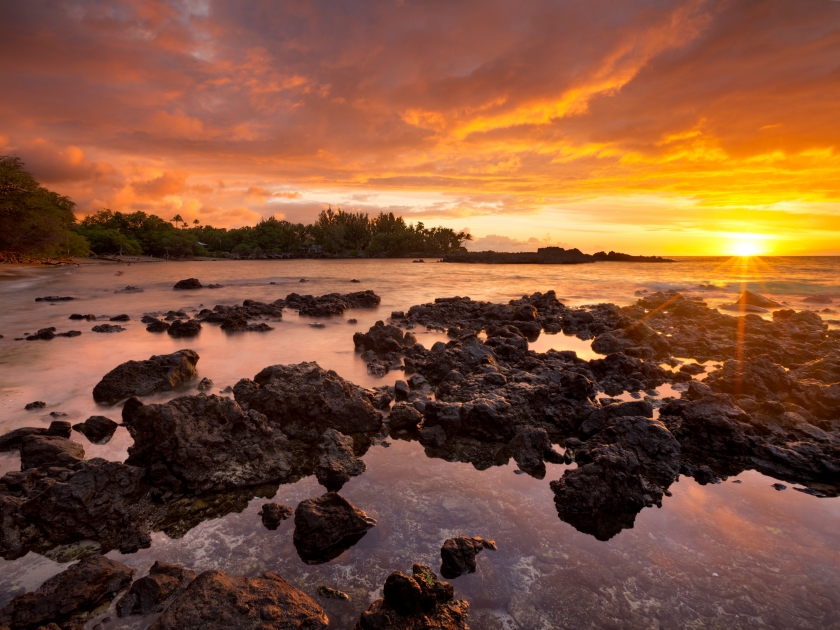 Spectacular sunset at Waialea Beach or Beach 69 on the Kohala Coast of Big Island Hawaii, USA.