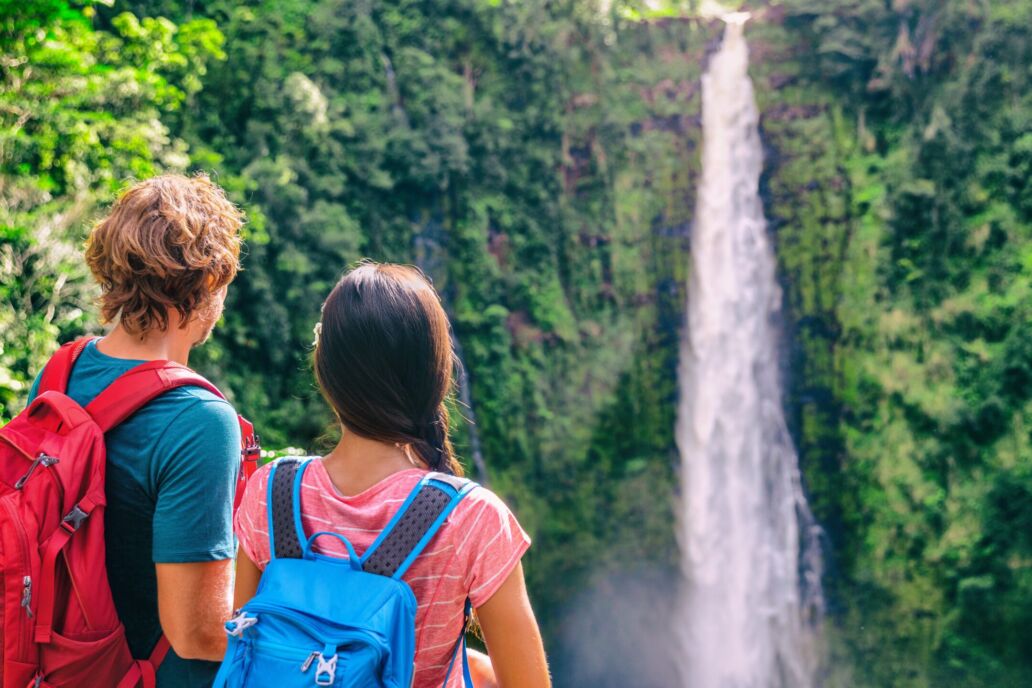 Hawaii,Travel,Tourists,At,Nature,Waterfall,Landscape.,Travelers,Couple,Looking