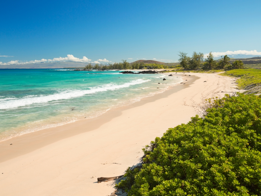 Makalawena Beach on Big Island Hawaii, USA, a beautiful remote white sand beach and turquoise water.