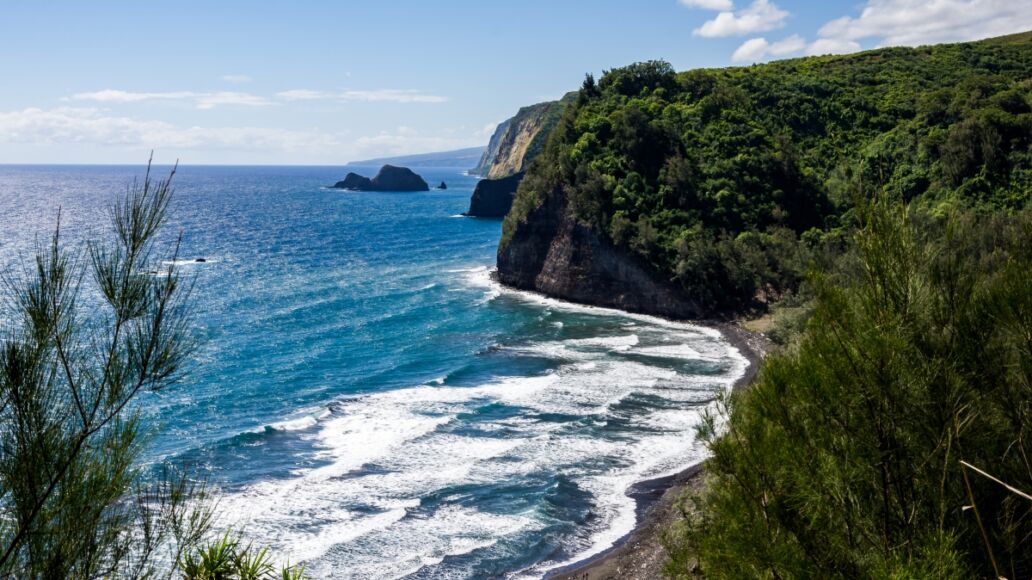 Hawaii Pololu Valley Lookout over cliff and sea and beach