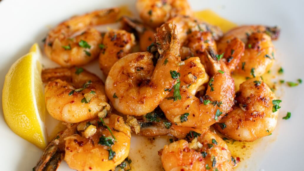 Pan fried butter garlic shrimp on plate