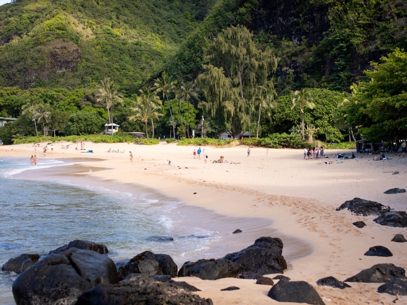 Haena Beach Park, Kauai US - July 20, 2024: a beautiful sandy Haena Beach park full of people on the North Shore of Kauai, Hawaii on a sunny day