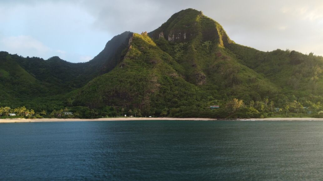 Ha'ena Beach, Kauai: Bask in the golden hour's warm embrace, as the sun casts a radiant glow over the pristine shoreline, creating a picture-perfect moment. 🌅🏖️