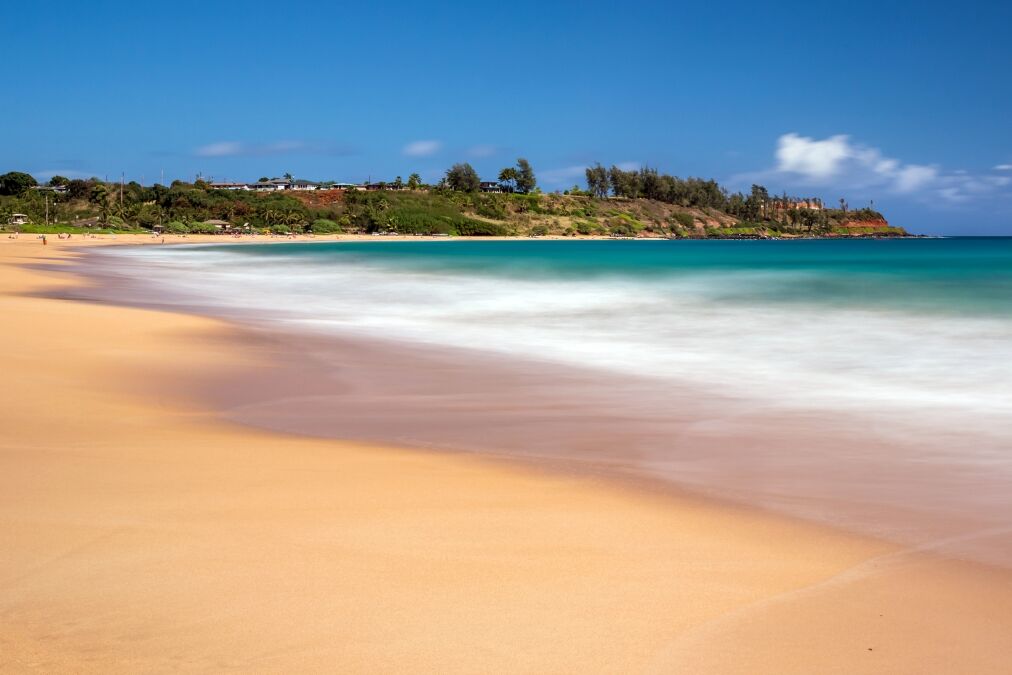 Day time long exposure at Kealia beach on the tropical island of Kauai, Hawaii