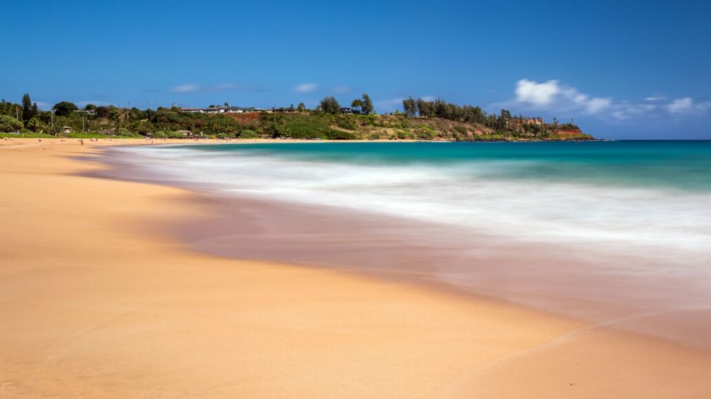 Day time long exposure at Kealia beach on the tropical island of Kauai, Hawaii