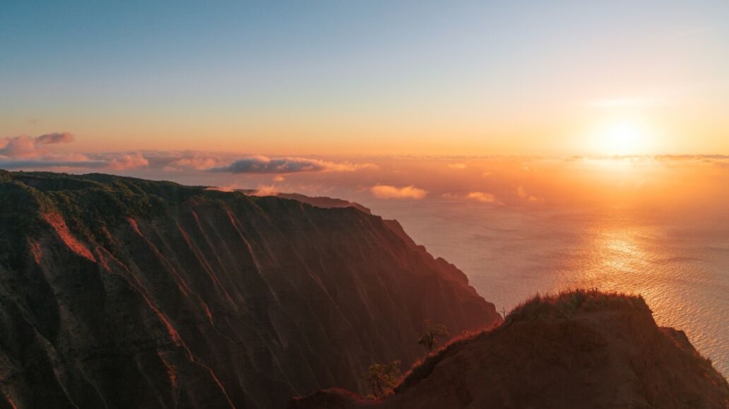 Sunset over the ocean in Kokee State Park on Kauai, HI