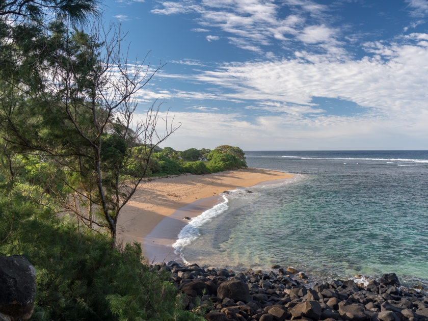 Deserted sandy Larsen's Beach near Pakala point on Kauai