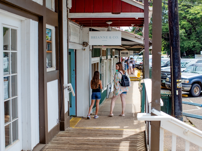 Koloa, Kauai, Hawaii, US - July 24, 2024: downtown streets and shopping district of Old Town of Koloa, with stores, restaurants, boutiques, coffee shops and galleries, South Shore of Kauai, Hawaii.