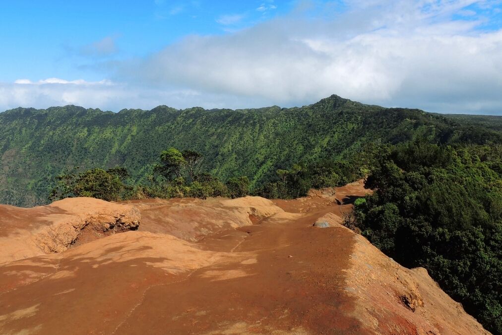 view of pihea peak and the start of the pihea trail hike from the kalalau valley overlook in kauai, hawaii