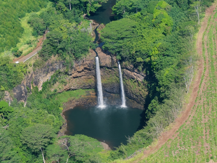 Aerial photo from a tourist plane of a beautiful Wailua Falls on the Island of Kauai, Hawaii