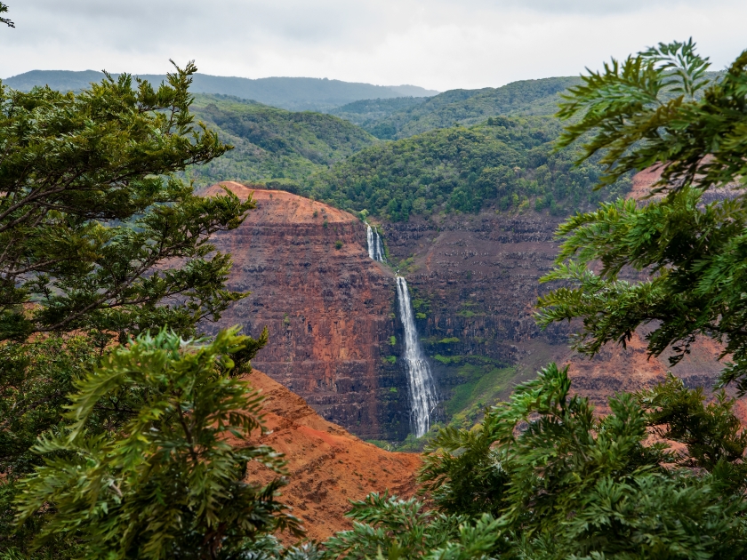 Pu'u Ka Pele lookout near mile marker 13 is as close as you can get to the Waipo`o Falls along Highway 550.