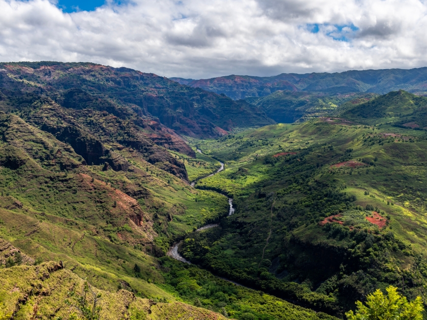 Waimea River and the lush valley on the island of Kauai, Hawaii, United States.