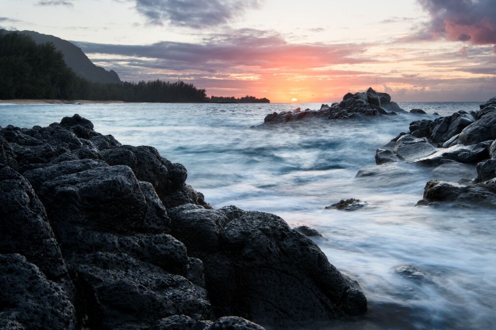 Kauapea Beach, also known as secret beach, Kauai, Hawaii, at sunset