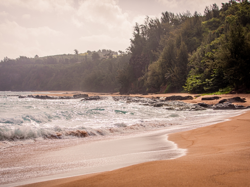 Kauapea (Secret ) Beach, Kauai, Hawaii. Secluded beach with a cliff accessible by a pretty steep trail