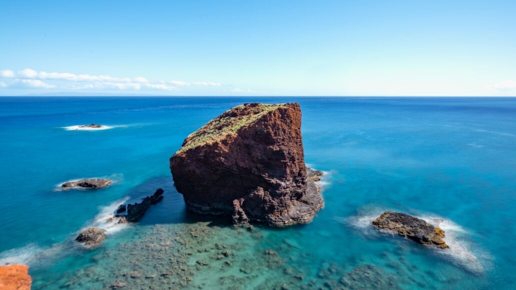 Sweet Heart Rock, a famous lookout point on Lanai, Hawaii / long exposure with smooth water