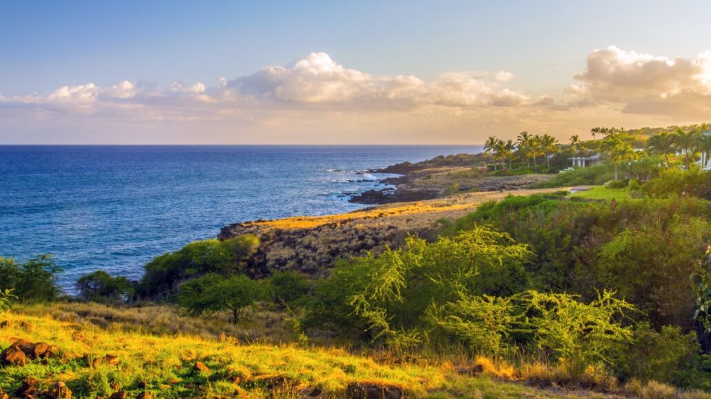 Aerial view of Lanai, Hawaii at sunset. Lanai, a short ferry ride from Lahaina, Maui, is colloquially known as the Pineapple Island because of its past as a pineapple plantation.