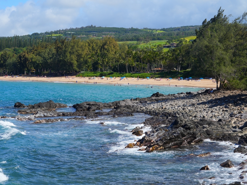 D.T. Fleming Park beach as seen from Makaluapuna Point in West Maui, Hawaii - Rocky coastline with high surf in the Pacific Ocean