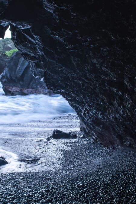 Cave along the shoreline in Hana Maui