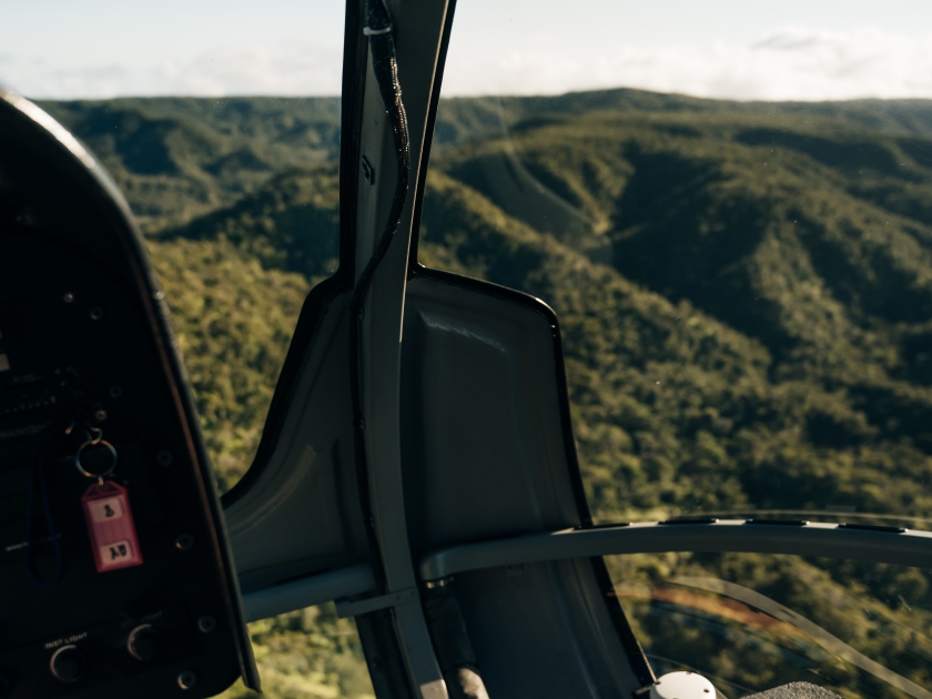 inside the cockpit of a helicopter in hawaii. High quality photo