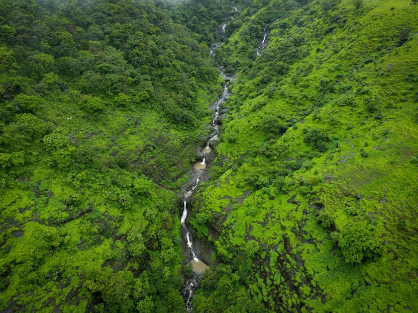 A drone shot of a Honokohau waterfall, Hawaii