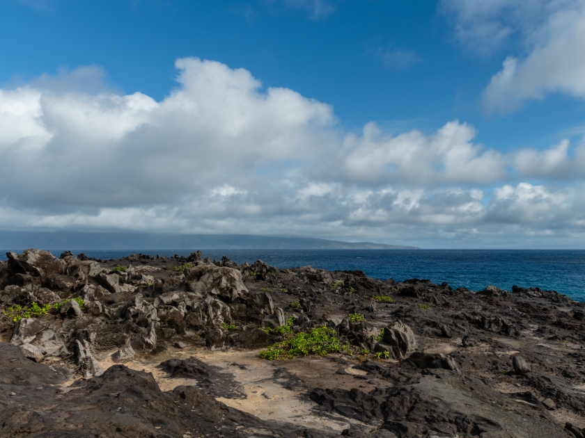 Beautiful Kapalua Coastal Trail vista on Maui, Hawaii, with Molokai Island visible at a distance