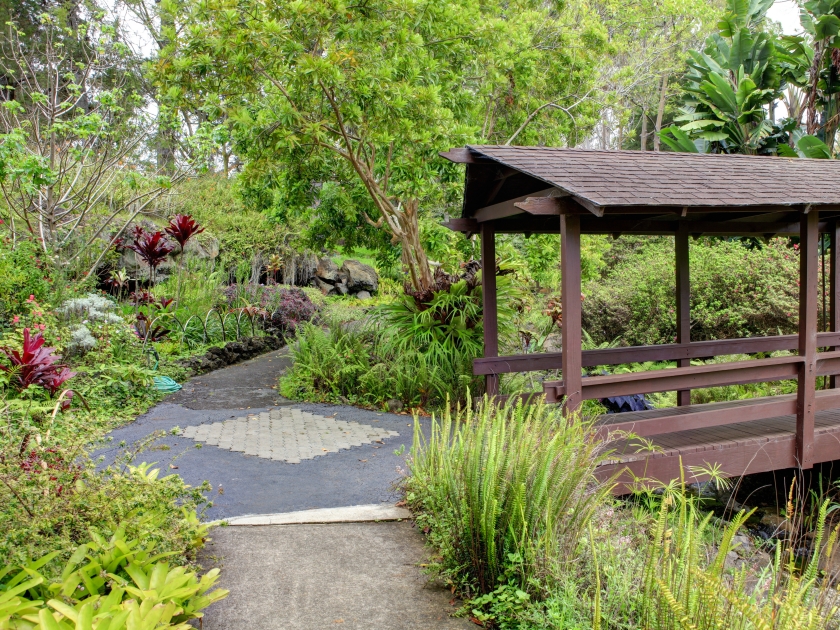 Kula Botanical Garden. Maui. Hawaii. Covered bridge. Tropical landscape.