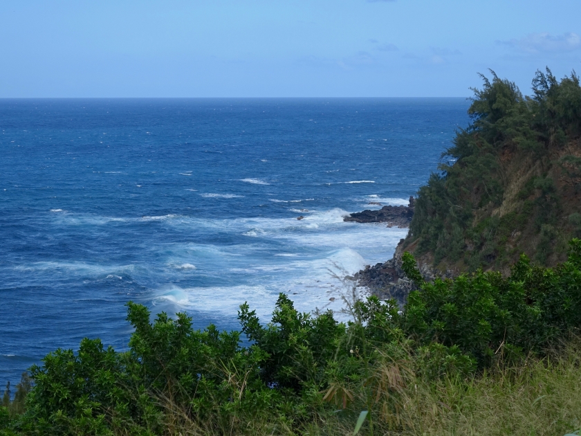 Beautiful cliff view of rolling surf waves at Peahi (Jaws) Maui