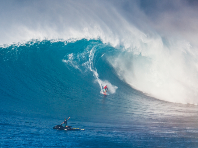 MAUI, HI - MARCHh 13: Professional surfer Yuri Soledade rides a giant wave at the legendary big wave surf break known as 