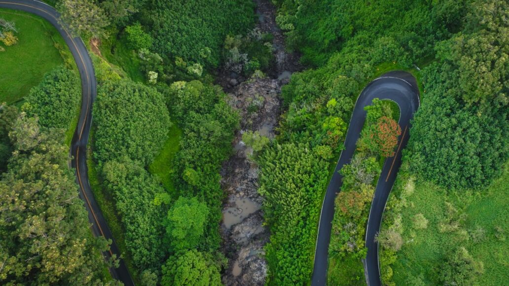 An aerial drone view of Hana Highway on the Road to Hana in Maui, Hawaii.