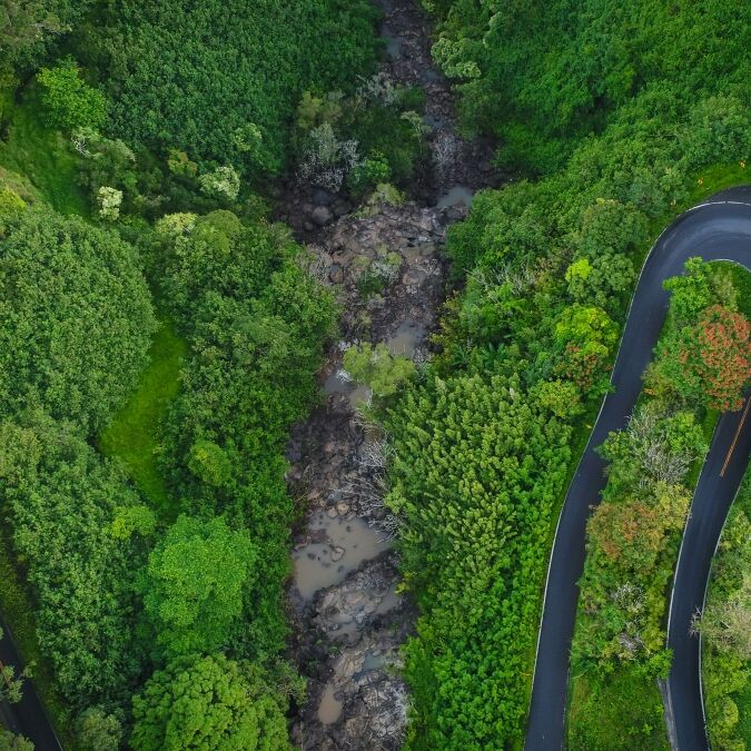 An aerial drone view of Hana Highway on the Road to Hana in Maui, Hawaii.