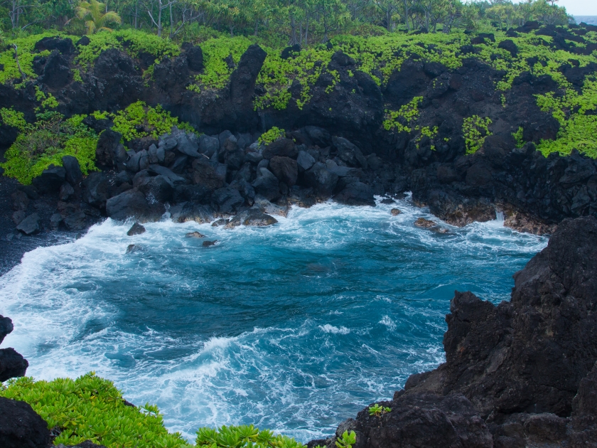 Amazing Waianapanapa State Park on the East side of the beautiful Island of Maui, Hawaii. You can hike along the beautiful bay through pineapple trees and a spouting horn. You'll love the scenery.