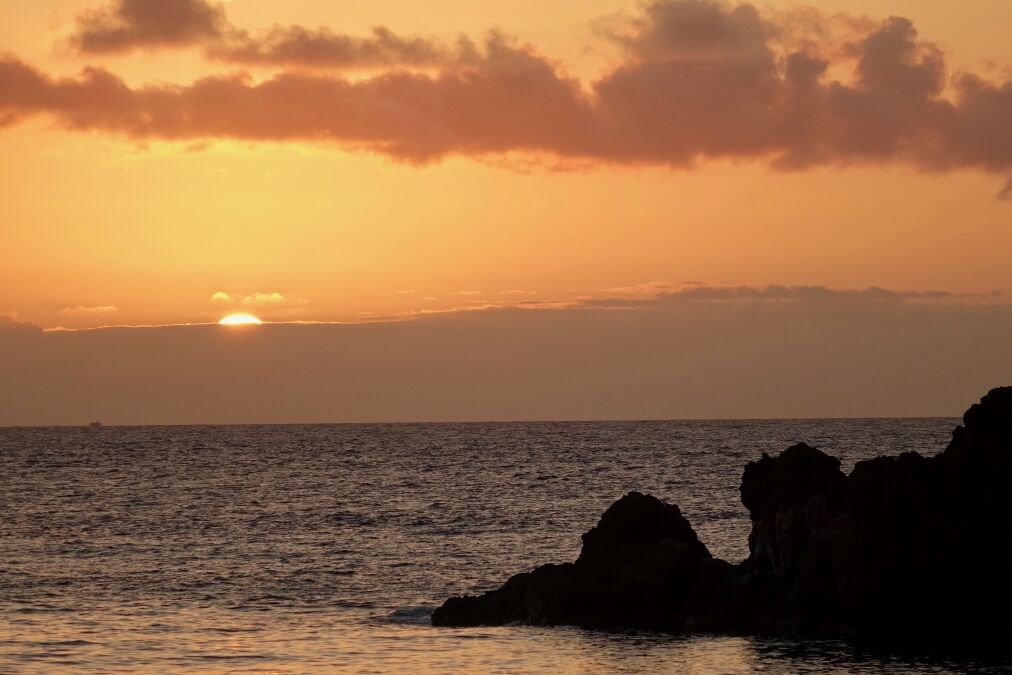 Sunset at Black Rock (Pu'u Keka'a) Maui. View from boardwalk that runs in front of Sheraton Maui.