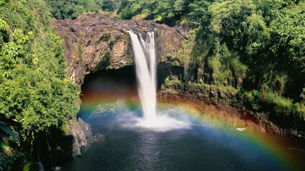 Beautiful Rainbow Waterfalls in Paradise on the Big Island in Hawaii. Wailua Waterfall near the island capital Lihue on the island of Kauai, Hawaii.