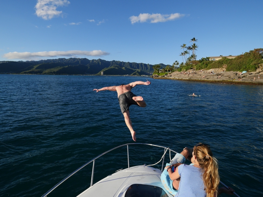 Jumping head first from a yacht boat in China walls Oahu island hawaii