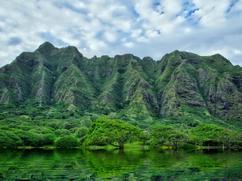 Koolau Range reflection with water in Oahu island, Hawaii USA