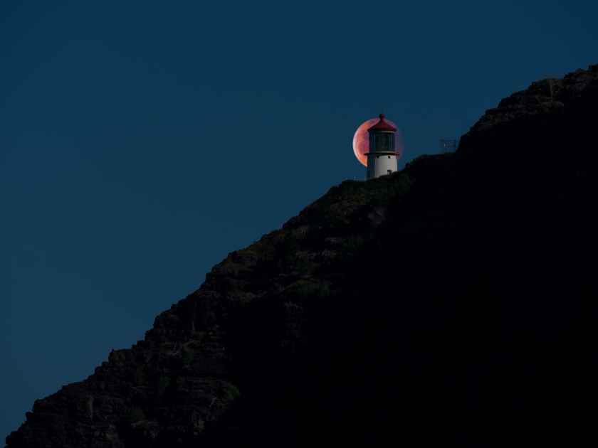 Super Blood Wolf Moon eclipse behind Makapu'u Lighthouse in Honolulu, Hawaii