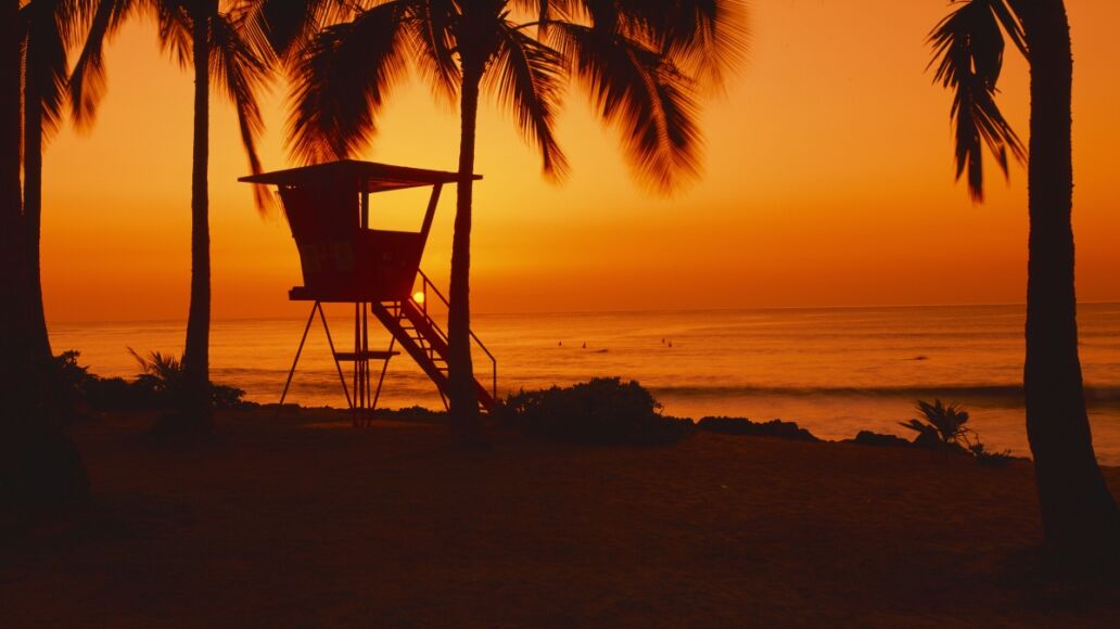 Sunset on lifeguard tower at Wailua Bay, North Shore, Oahu, Hawaii