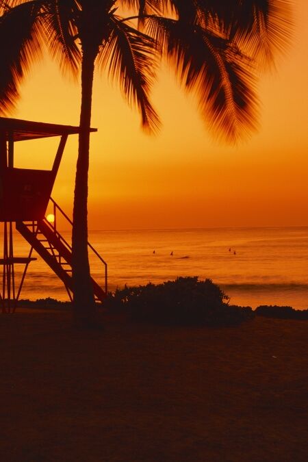 Sunset on lifeguard tower at Wailua Bay, North Shore, Oahu, Hawaii