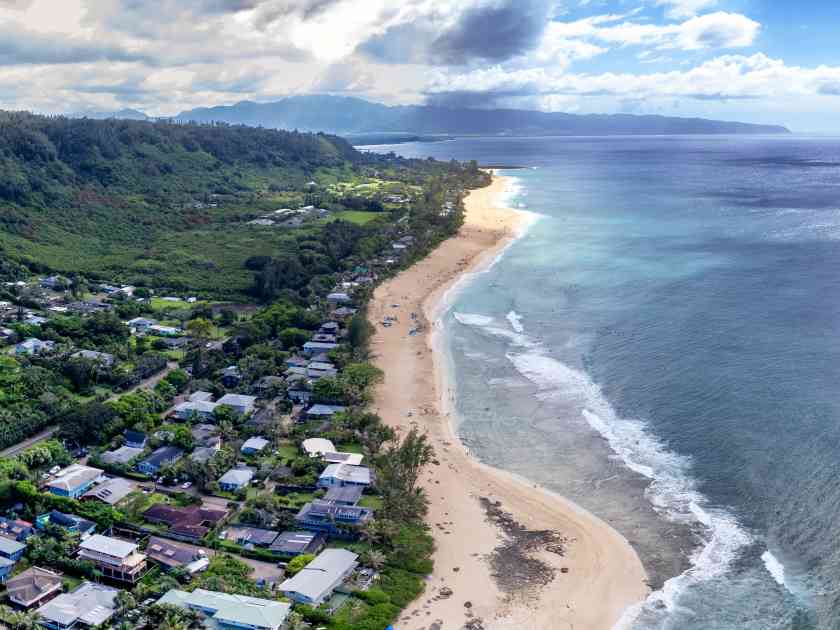 Panoramic aerial view of the north shore of Oahu, Hawaii, overlooking Ehukai Beach known for its large winter waves